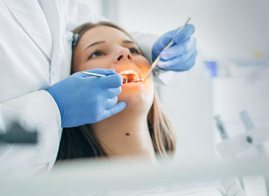 Patient in dental chair at hygiene appointment